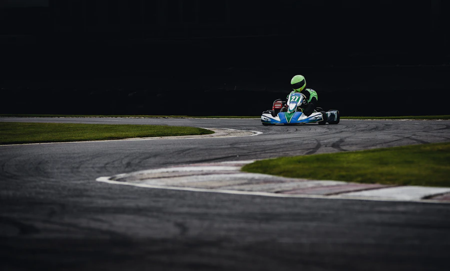 Racer cornering hard on the Two Rivers floodlit sprint circuit