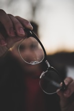 shallow photography of eyeglasses