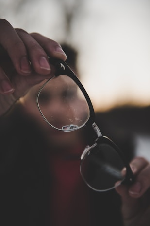 shallow photography of eyeglasses