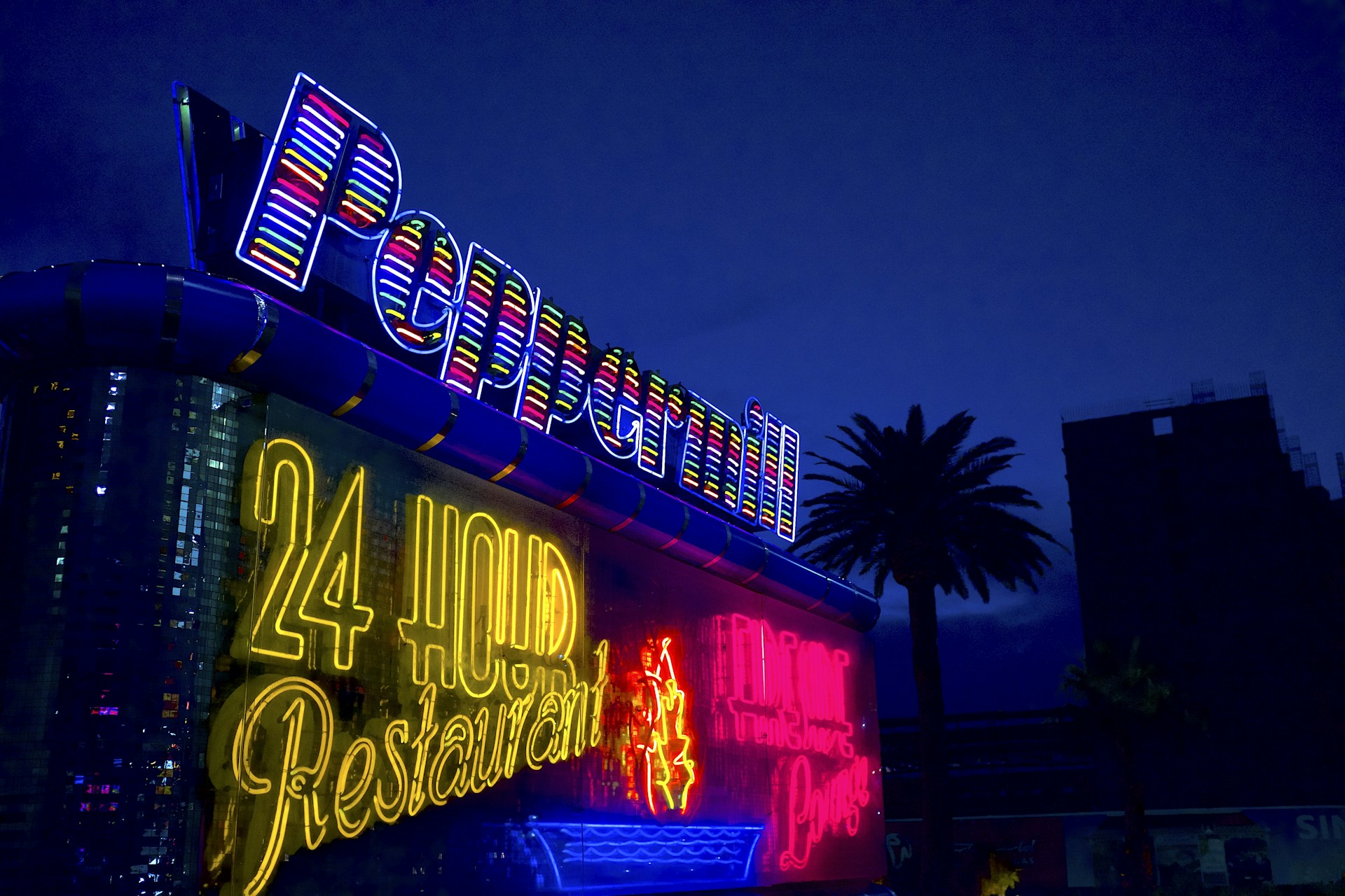woman wearing yellow long-sleeved dress under white clouds and blue sky during daytime
