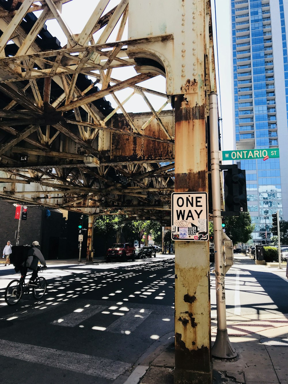 photo of one way road signage near Ontario St. signage