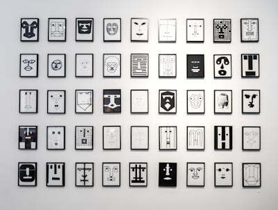 Close-up of a printable wall art featuring delicate line drawings on a white background.