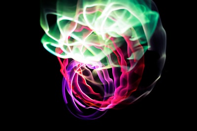 green, red, and purple optical illustration trippy zoom background