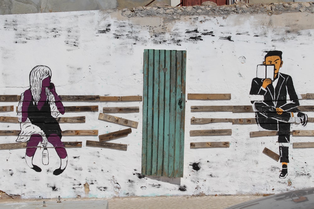 man and woman sitting on bench mural wall art