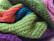 Close-up of soft, stretchy leggings fabric with vibrant patterns.