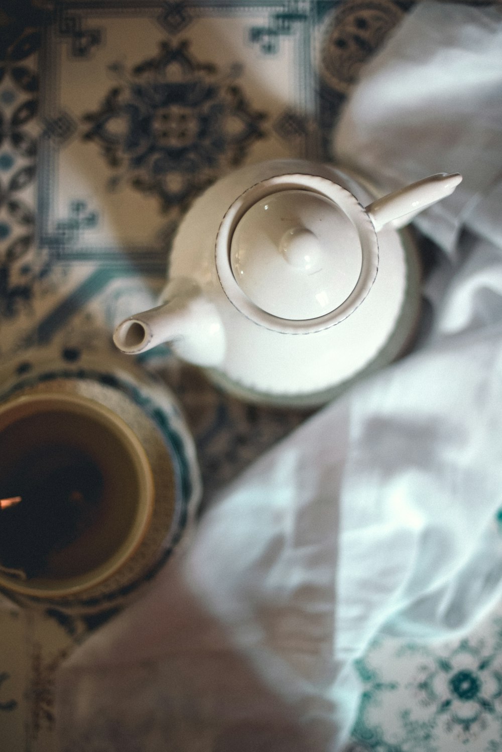 white ceramic teapot