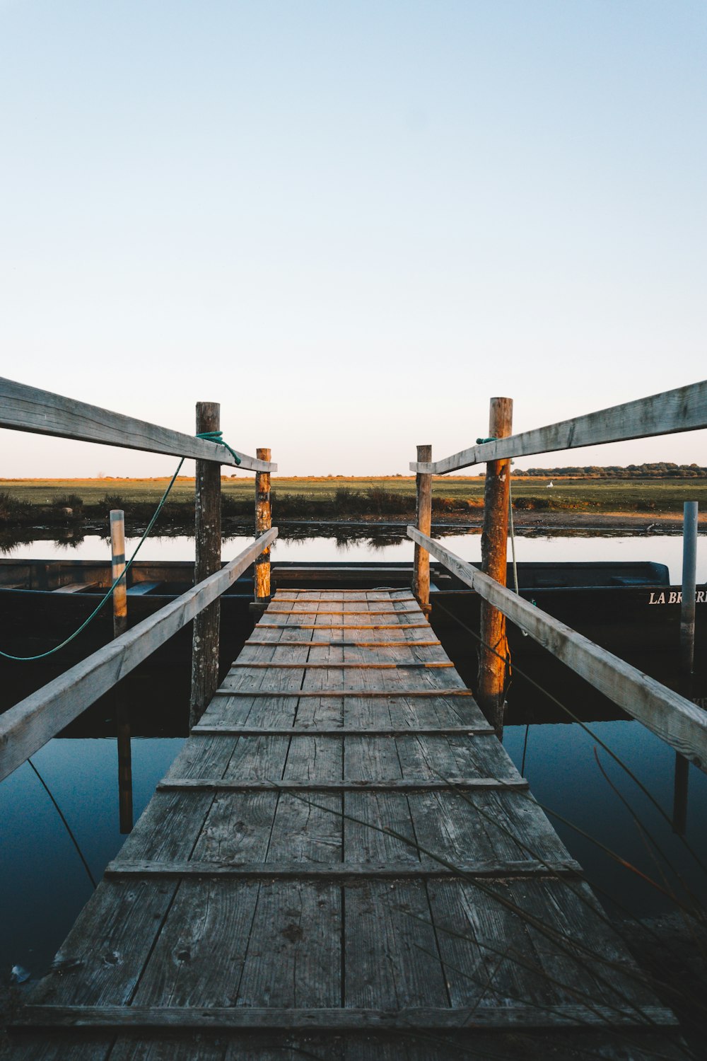 brown wooden bridge during daytime