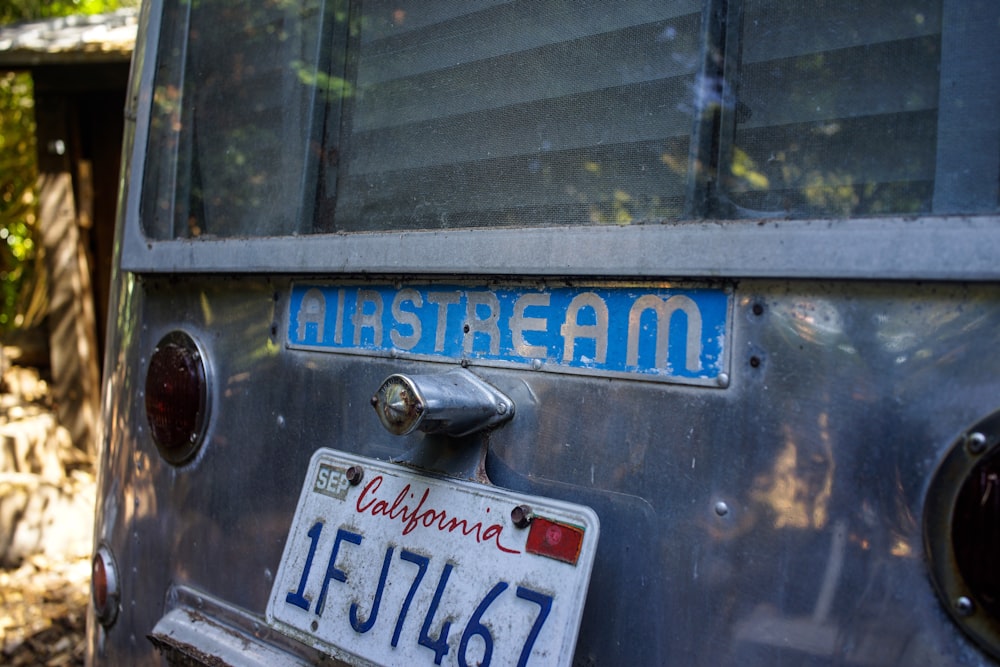 a close up of a license plate on a bus