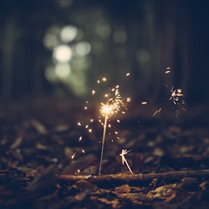 selective focus photography of sparklers