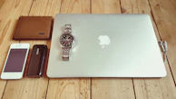 A neatly packed travel pouch filled with Dorobe’s compact gadgets on a wooden table.