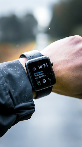 A person reviewing a health coaching app dashboard on their phone at home