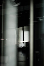 Abstract composition of intersecting lines and shadows evoking precision and balance.