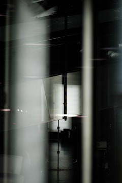 Abstract composition of shadows and reflections in an urban environment.