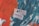A textured abstract background with bold strokes of orange and dark teal. Two pieces of paper with the words 'Art' and 'Advocacy' written on them are prominently placed in the center.