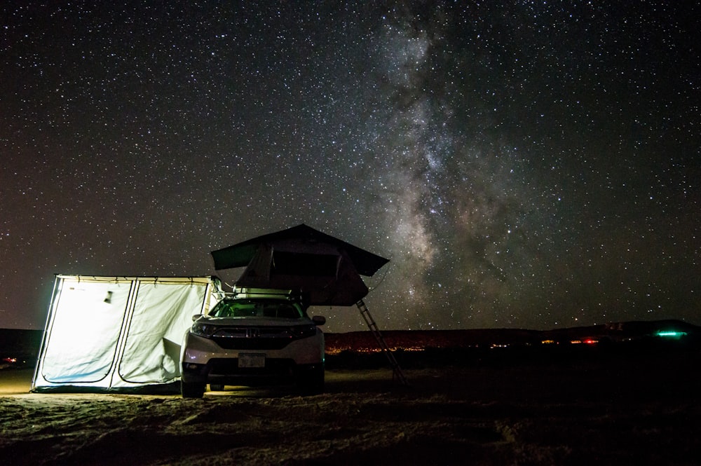 white car near milky way