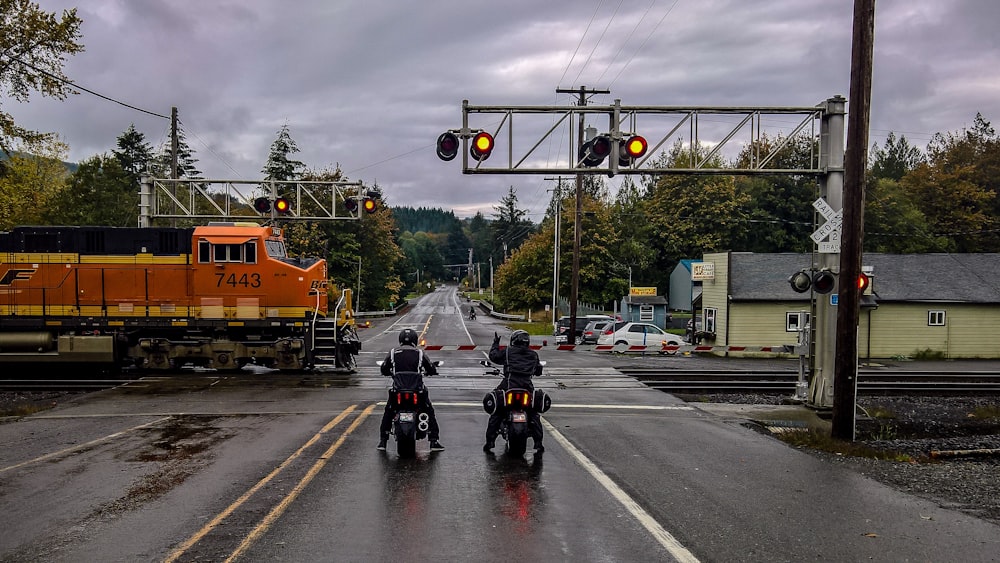 two motormen under tower