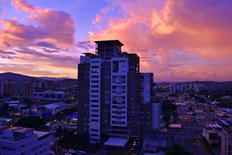 A modern cityscape at dusk highlighting urban development and strategic land use.