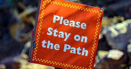 please stay on the path signage