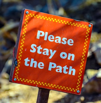 please stay on the path signage