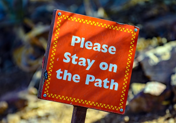 please stay on the path signage