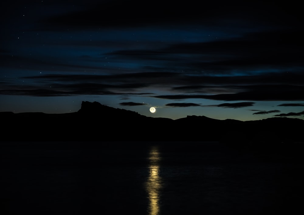 body of water during full moon