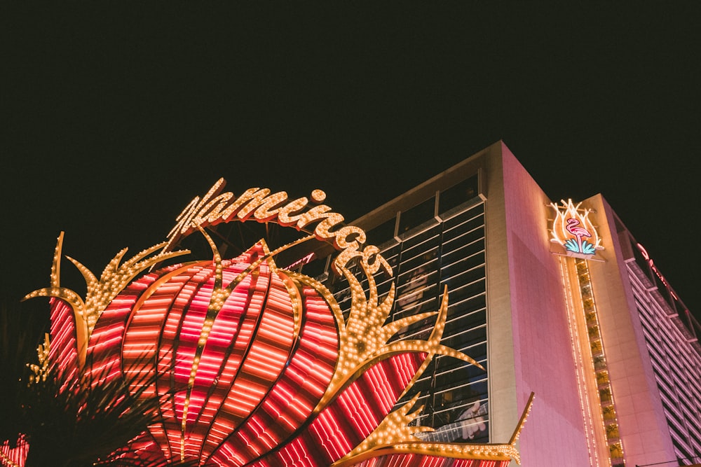 Flamingo building with turned on lights at night in high-angle photography