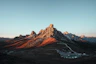 brown rock formation under blue sky