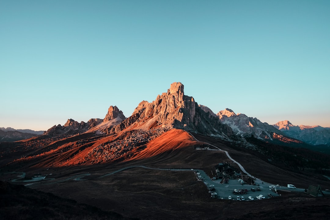 brown rock formation under blue sky