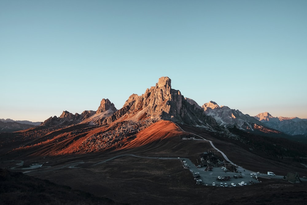 brown rock formation under blue sky