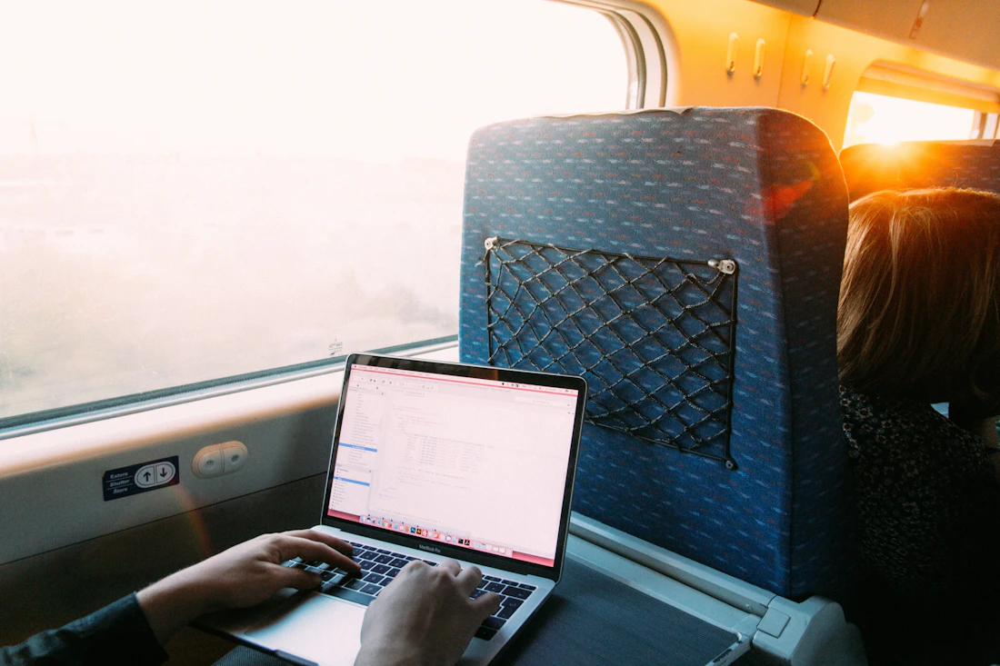 Booking travel on a laptop
