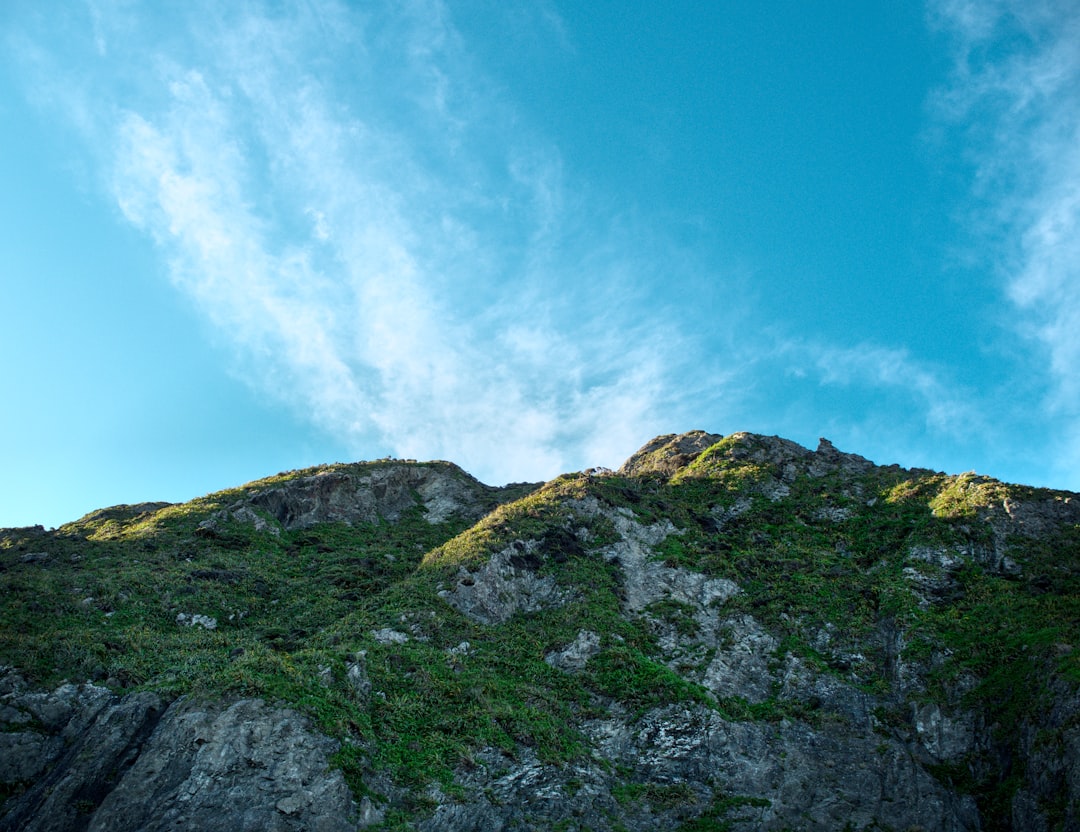 travelers stories about Hill in Red Rocks, New Zealand