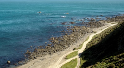 A scenic view of a coastal path in Brittany.