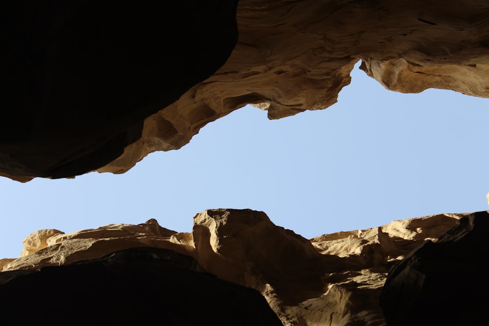 brown canyon under clear sky during daytime