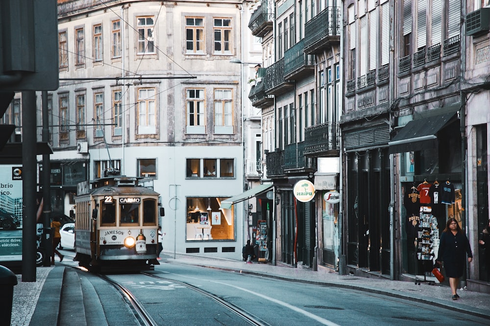 cable vehicle passing on road near building