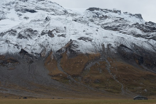 brown mountain covered with snow in Adelboden Switzerland