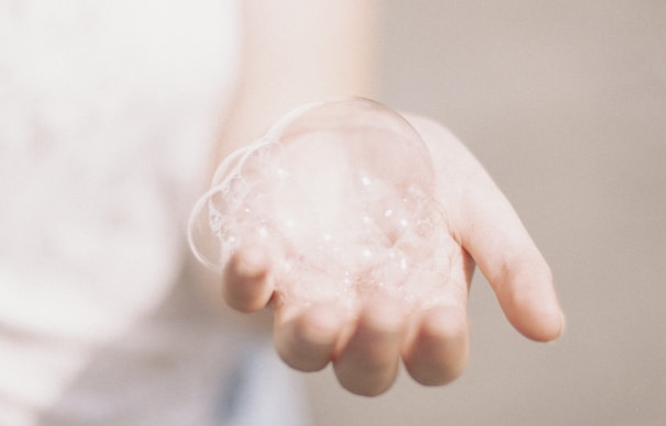 person holding bubbles