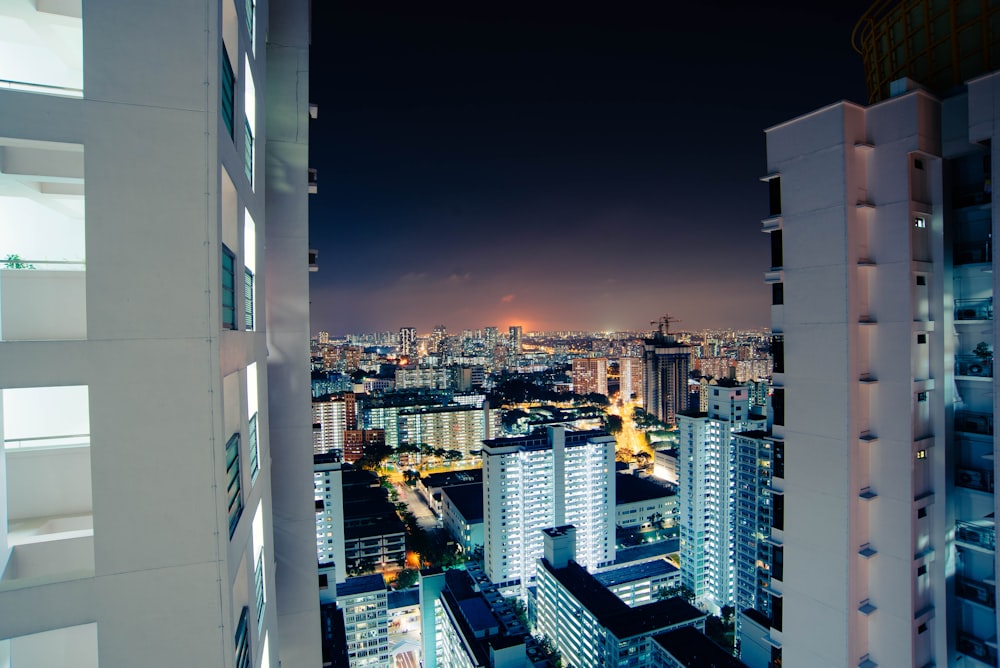 photo of high-rise building during nighttime 