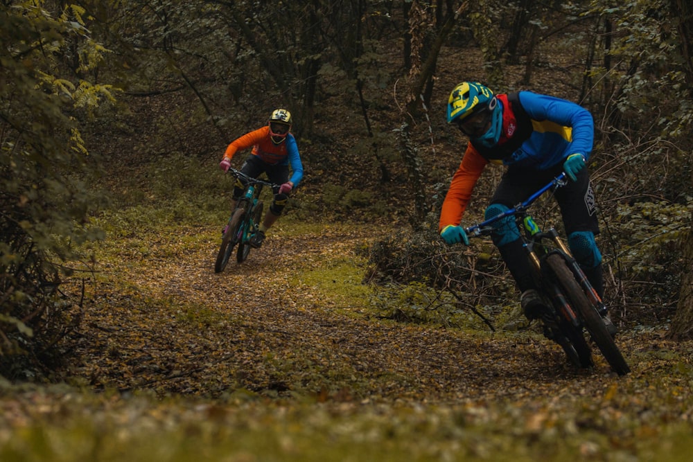 two person riding hardtail bikes on trail