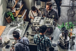 man buying coffee on counter