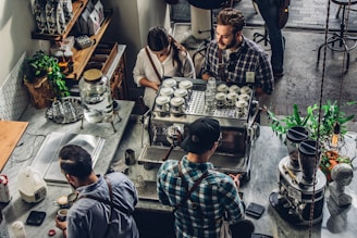 man buying coffee on counter