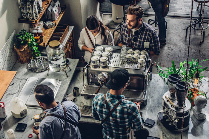 Customer buying coffee at a café counter