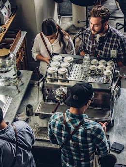 man buying coffee on counter