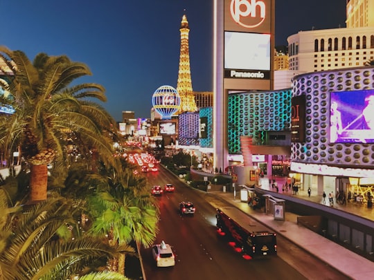 black bus near white concrete building in The Cosmopolitan of Las Vegas United States