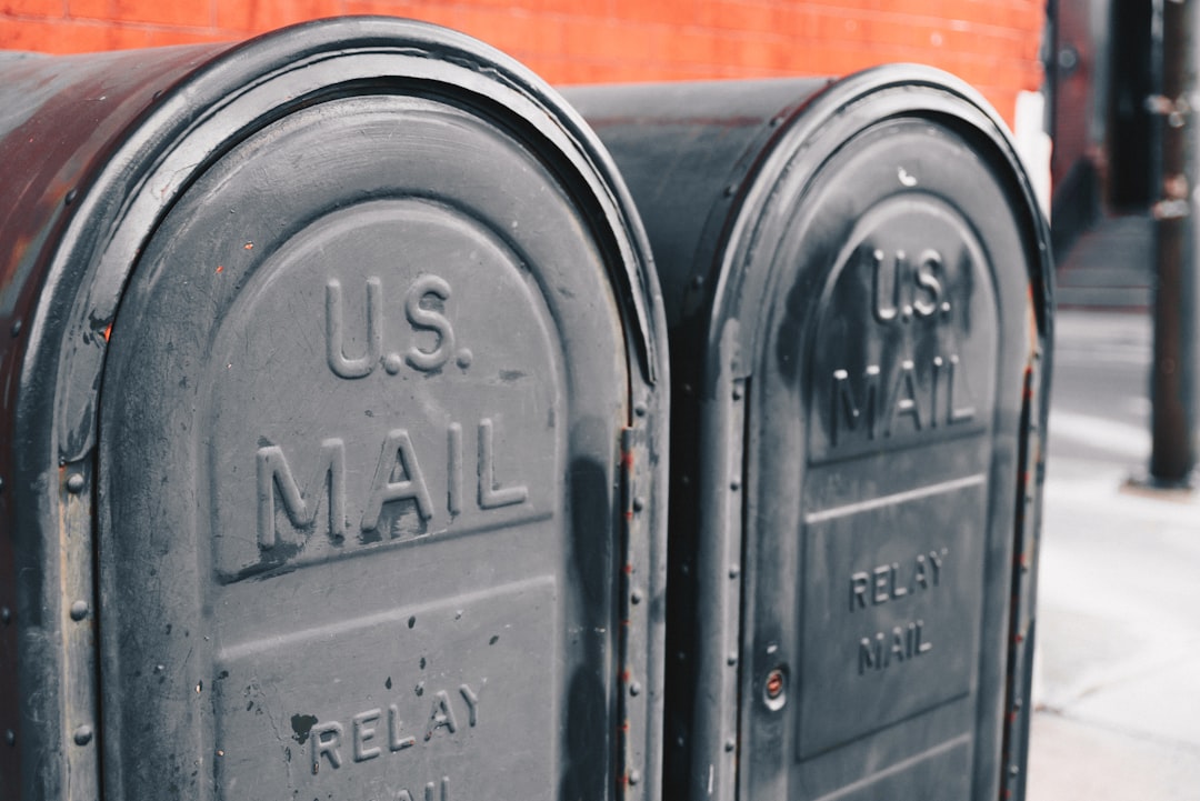 close view of two gray U.S mailboxes