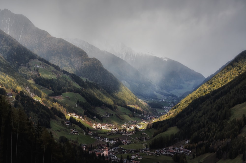 houses surrounded with mountains