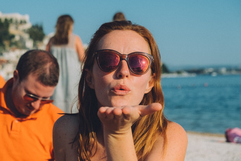 woman flying kiss