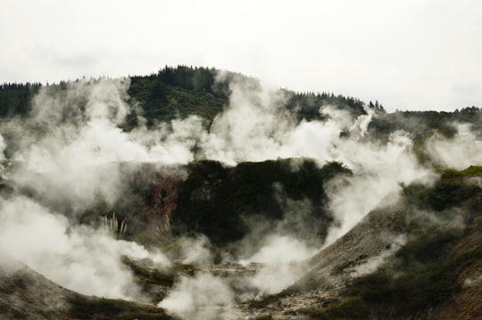 mountain covered with fog during daytime in Taupo New Zealand
