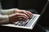 person using laptop
