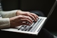 person using laptop