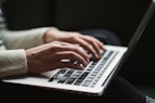 person using laptop